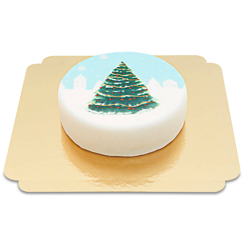 Gâteau Sapin de Noël sur paysage enneigé